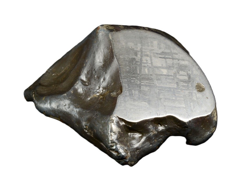The Rowton meteorite showing the cut and polished face with internal Widmanstätten structure